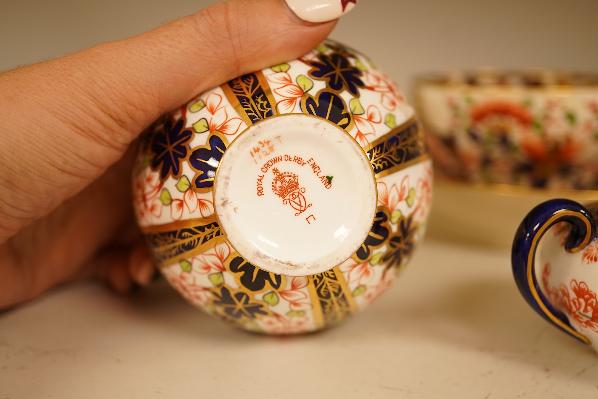 Twelve items of various patterns of Royal Crown Derby, largest item 27cm diameter